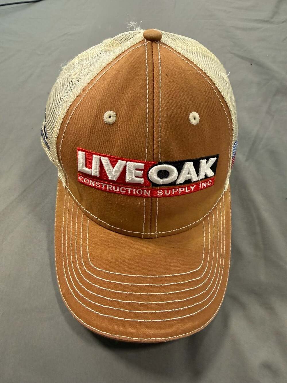 Oak Construction Supply Husqvarna Trucker Hat Brown Tan Snapback Cap